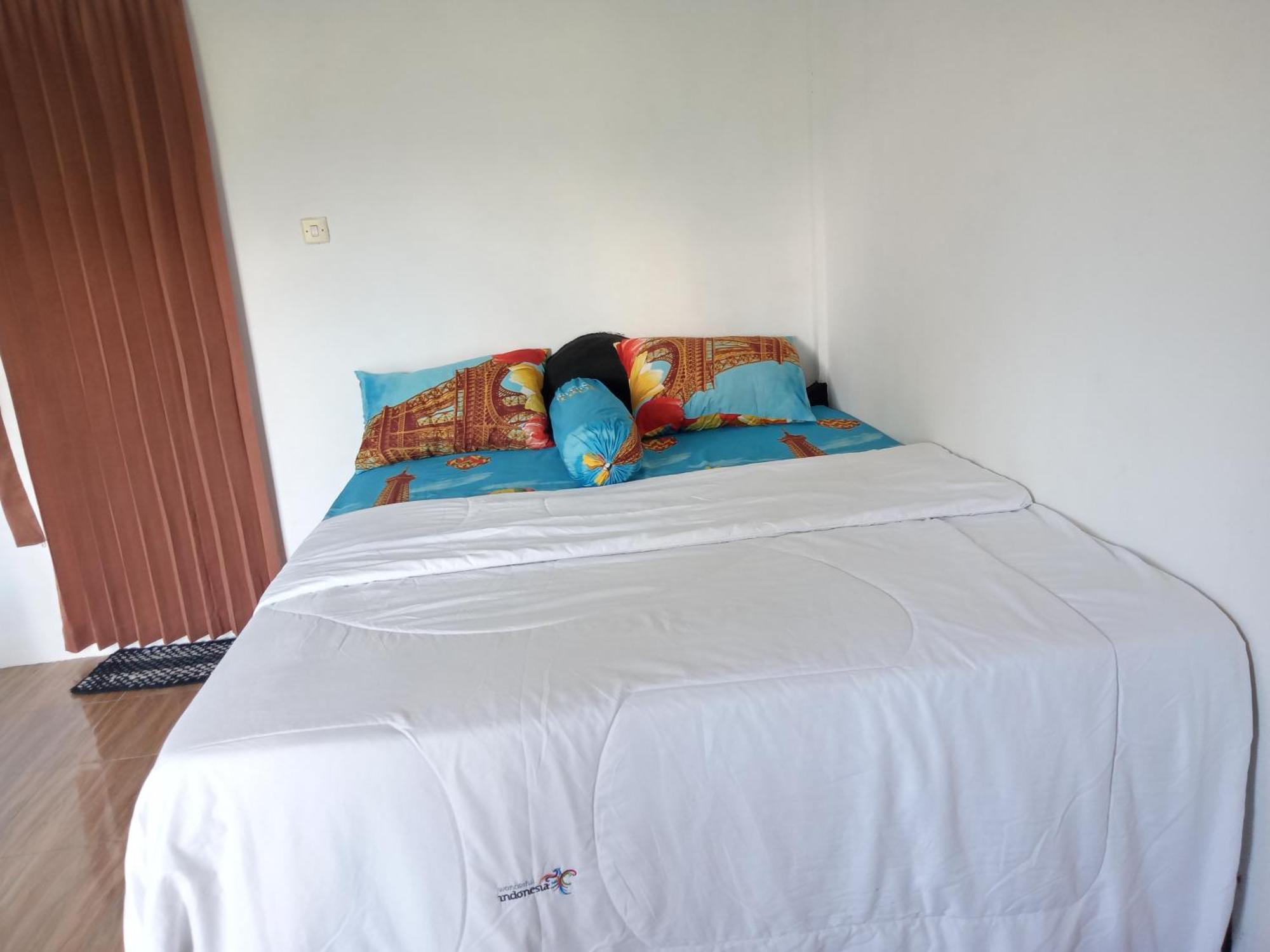 Ramdan Homestay Kuta  Pokoj fotografie