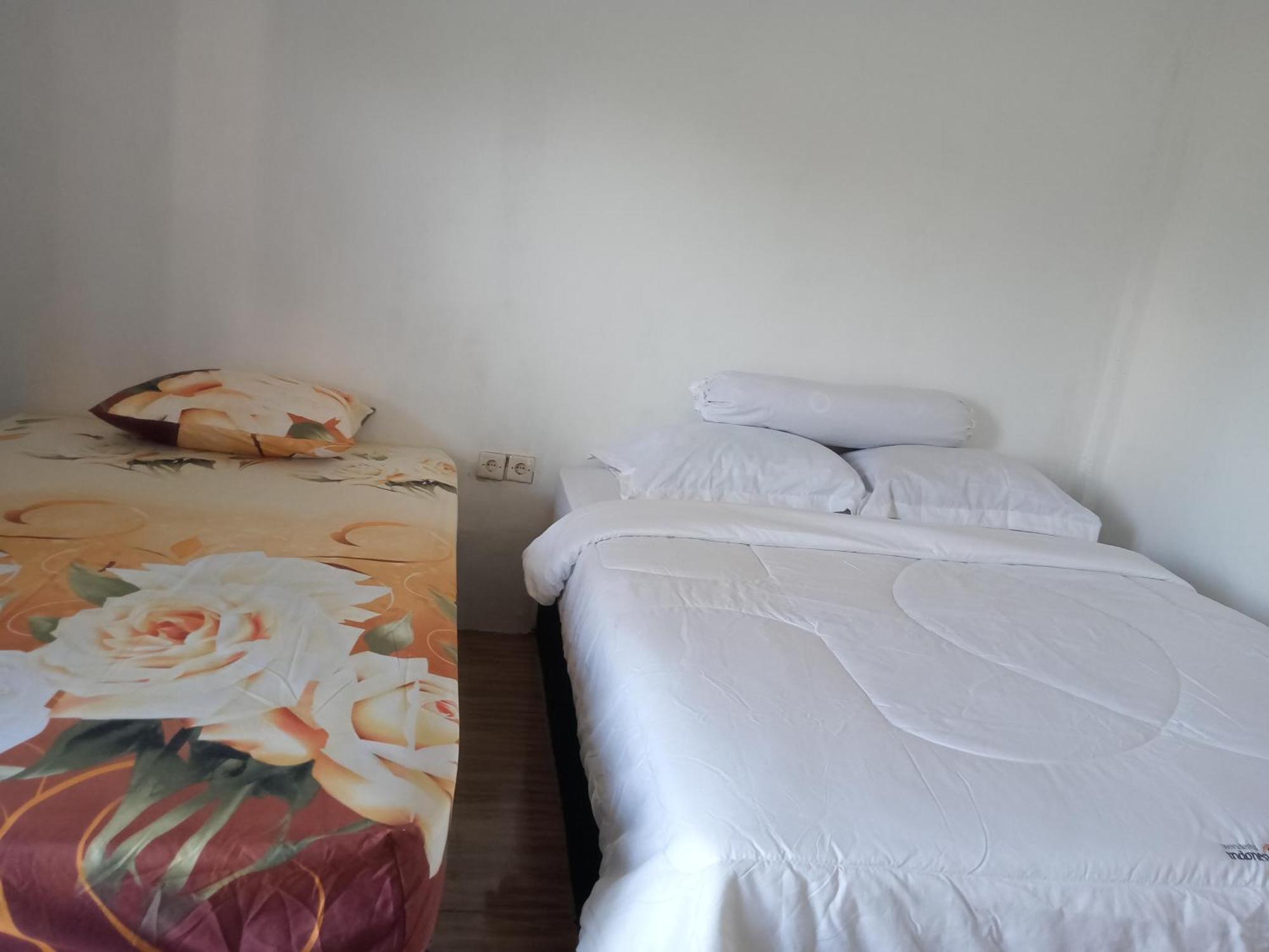 Ramdan Homestay Kuta  Pokoj fotografie