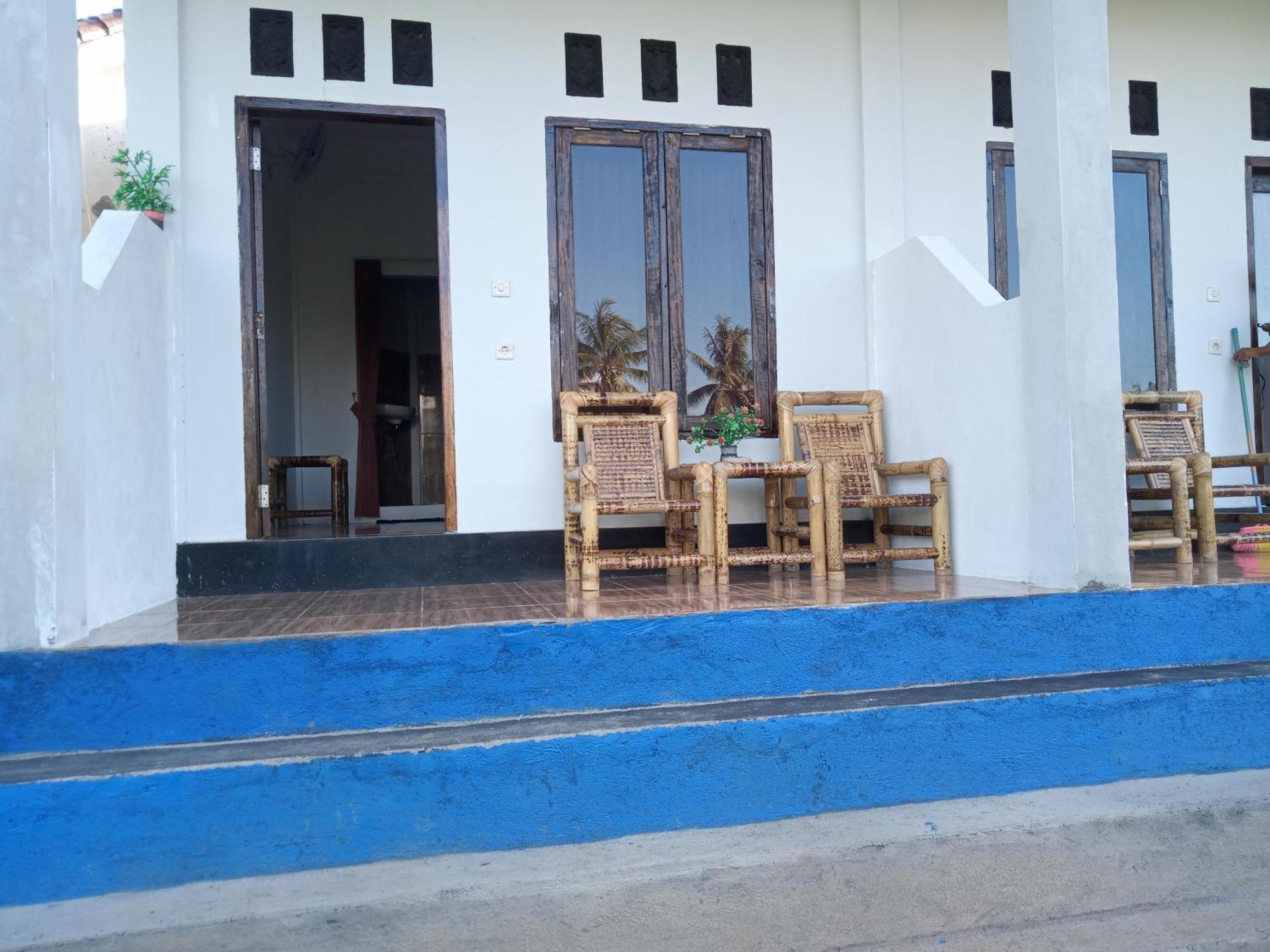 Ramdan Homestay Kuta  Pokoj fotografie