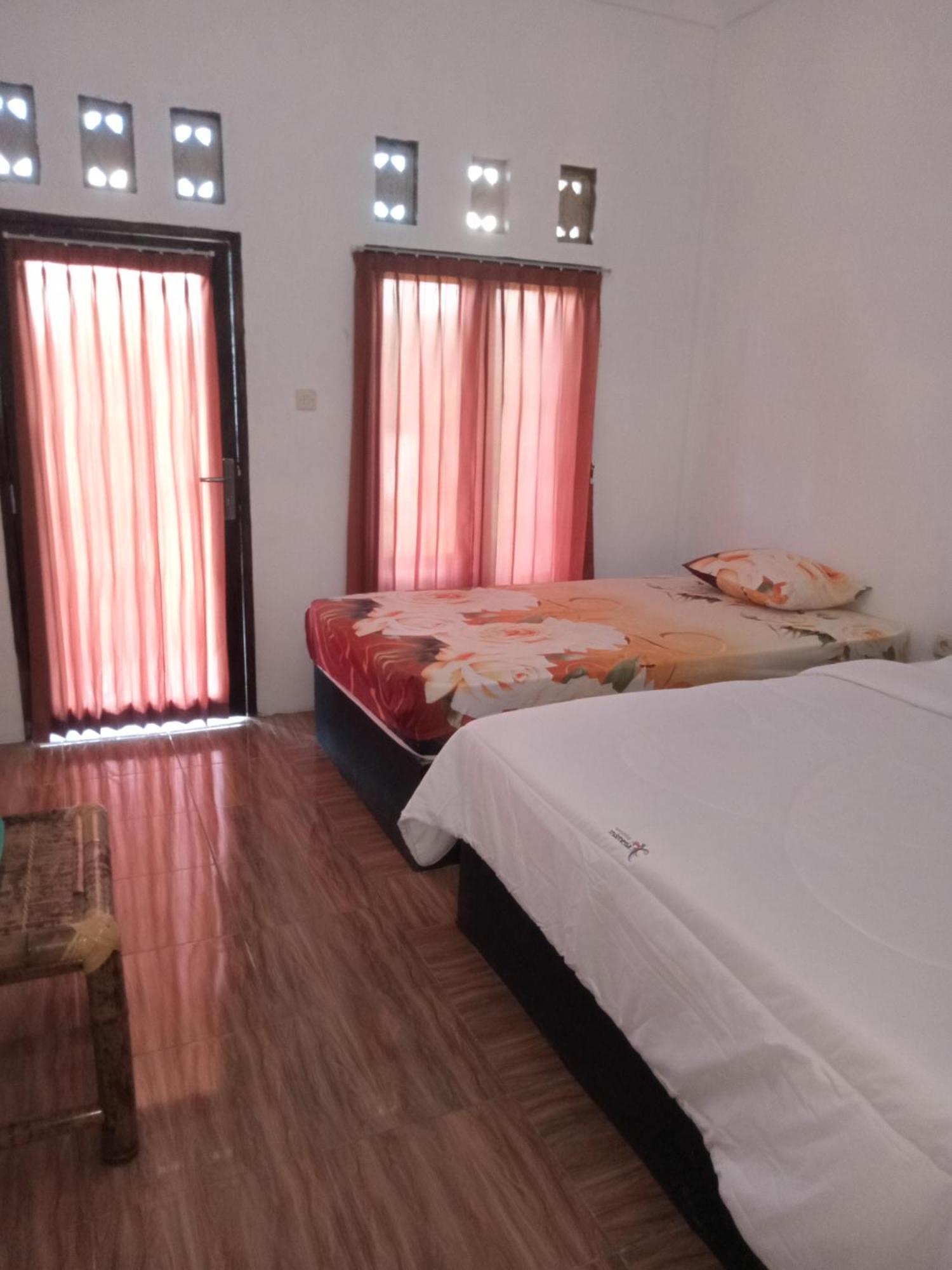 Ramdan Homestay Kuta  Pokoj fotografie