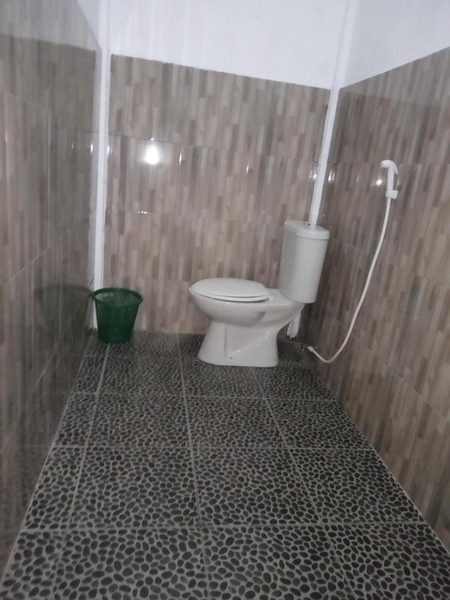 Ramdan Homestay Kuta  Pokoj fotografie