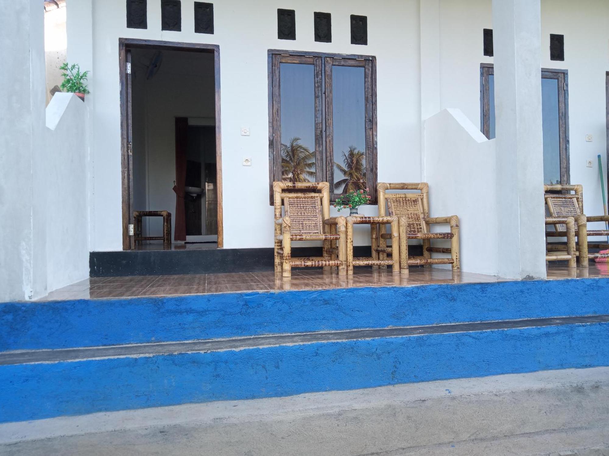 Ramdan Homestay Kuta  Pokoj fotografie