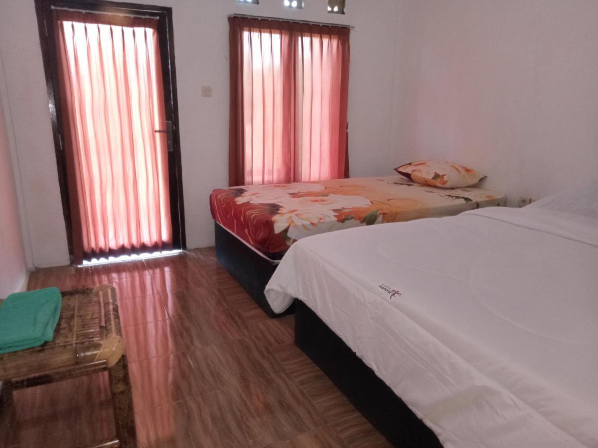 Ramdan Homestay Kuta  Pokoj fotografie